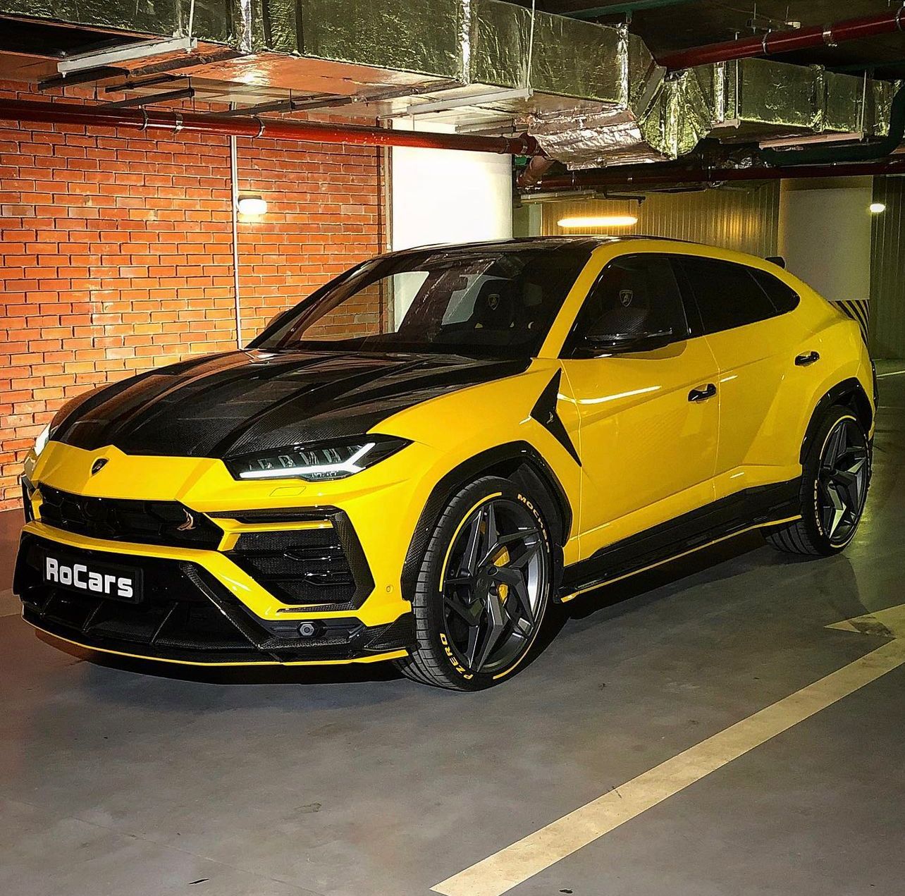 Yellow and Black Lamborghini Urus