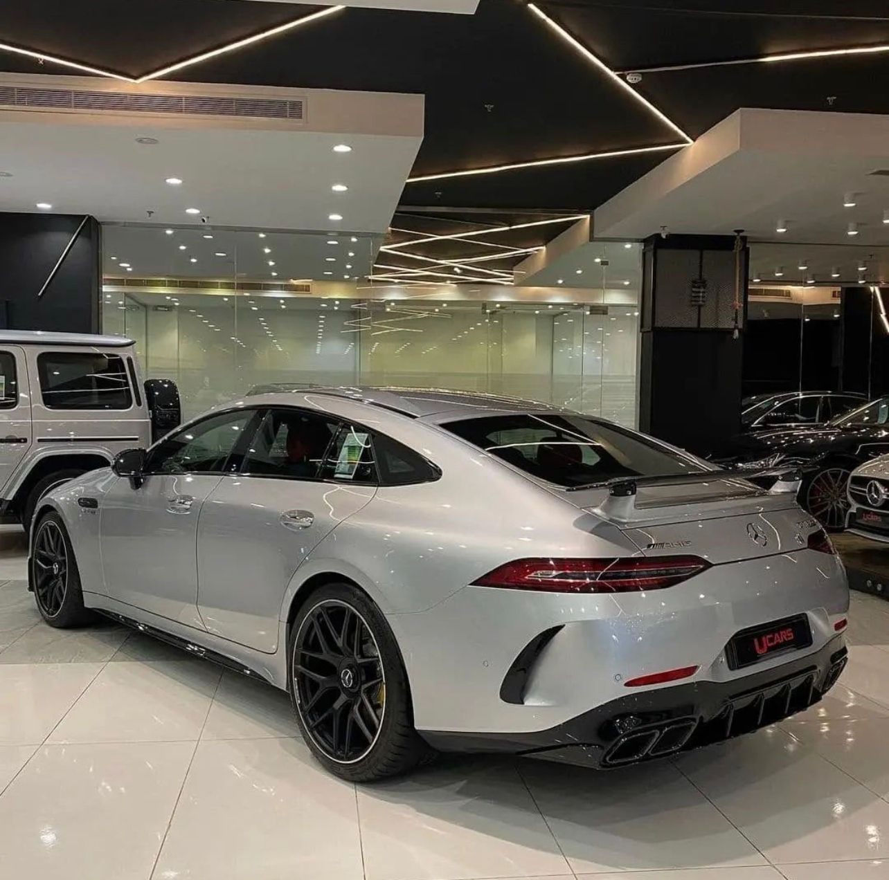 Mercedes Benz GT 63s AMG U from back Cars Showroom